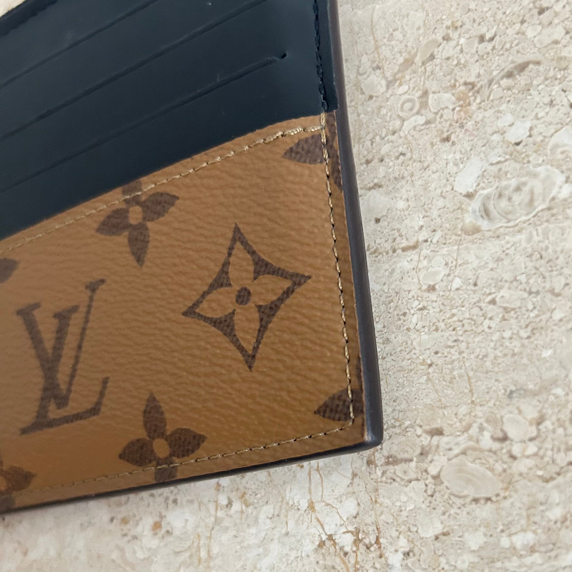 Pre-Owned LOUIS VUITTON Reverse Monogram Slim Purse