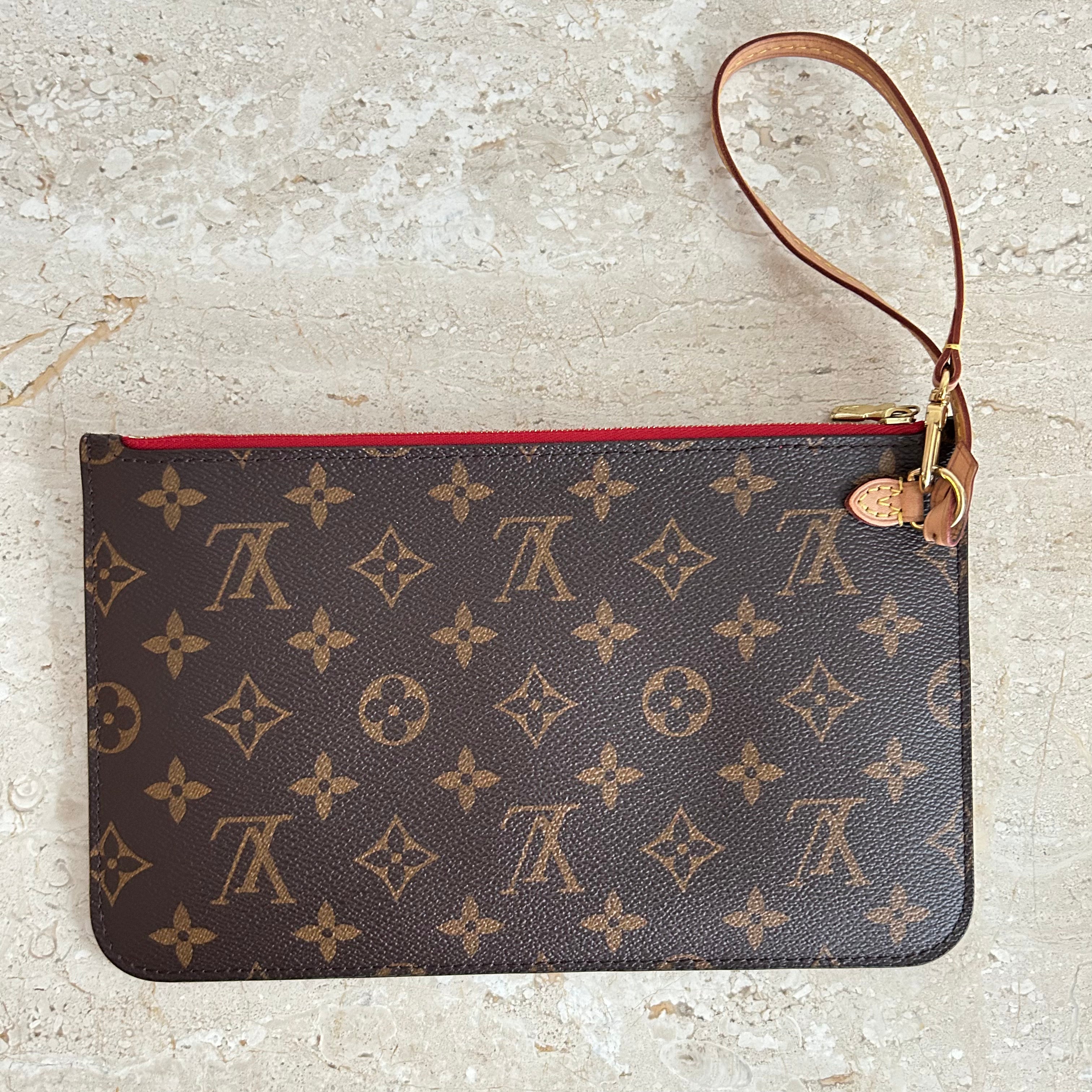 Pre-Owned LOUIS VUITTON Monogram Neverfull Wristlet