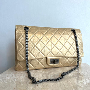 Pre-Owned CHANEL™ Gold Aged Calfskin Leather Reissue 227 Double Flap